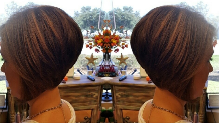 A rounded brown bob with copper highlights, shown from both sides